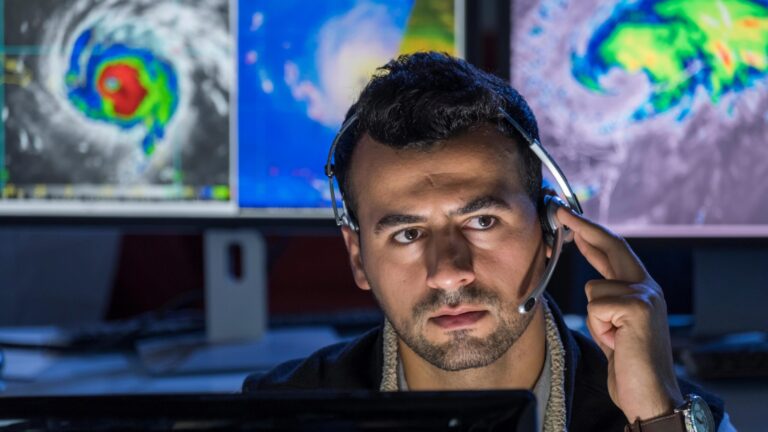 Man In Data Center Prepares For Storm